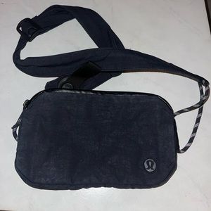 Lululemon Black Everyday Belt Bag. Older and smaller style.